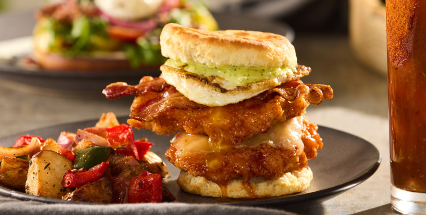 Hot honey chicken biscuit with potatoes and vegetables